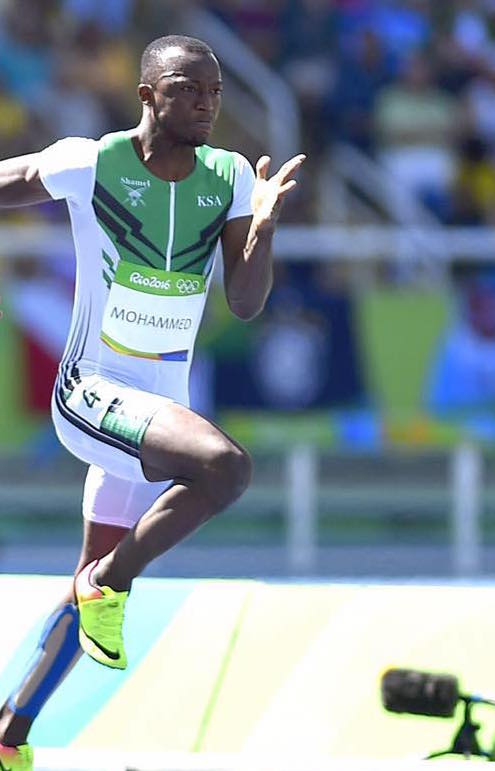 Male sprinter in action during an international track and field event, demonstrating power, discipline, and world-class athletic performance featured by HSI.net.