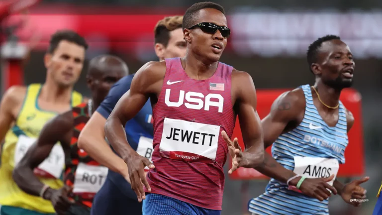 USA track and field athlete competing in the Tokyo 2020 Olympics, demonstrating elite sprinting performance and athletic excellence.