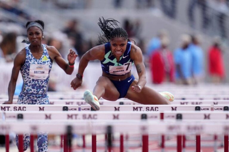 American hurdler competing in the women’s 100m hurdles at the Mt. SAC Relays, showcasing speed, focus, and athletic excellence during a track and field event, featured by HSI.net.