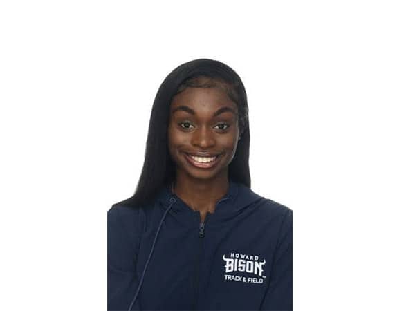 Howard University Bison Track and Field athlete smiling in team uniform – representing excellence in collegiate athletics at Howard University
